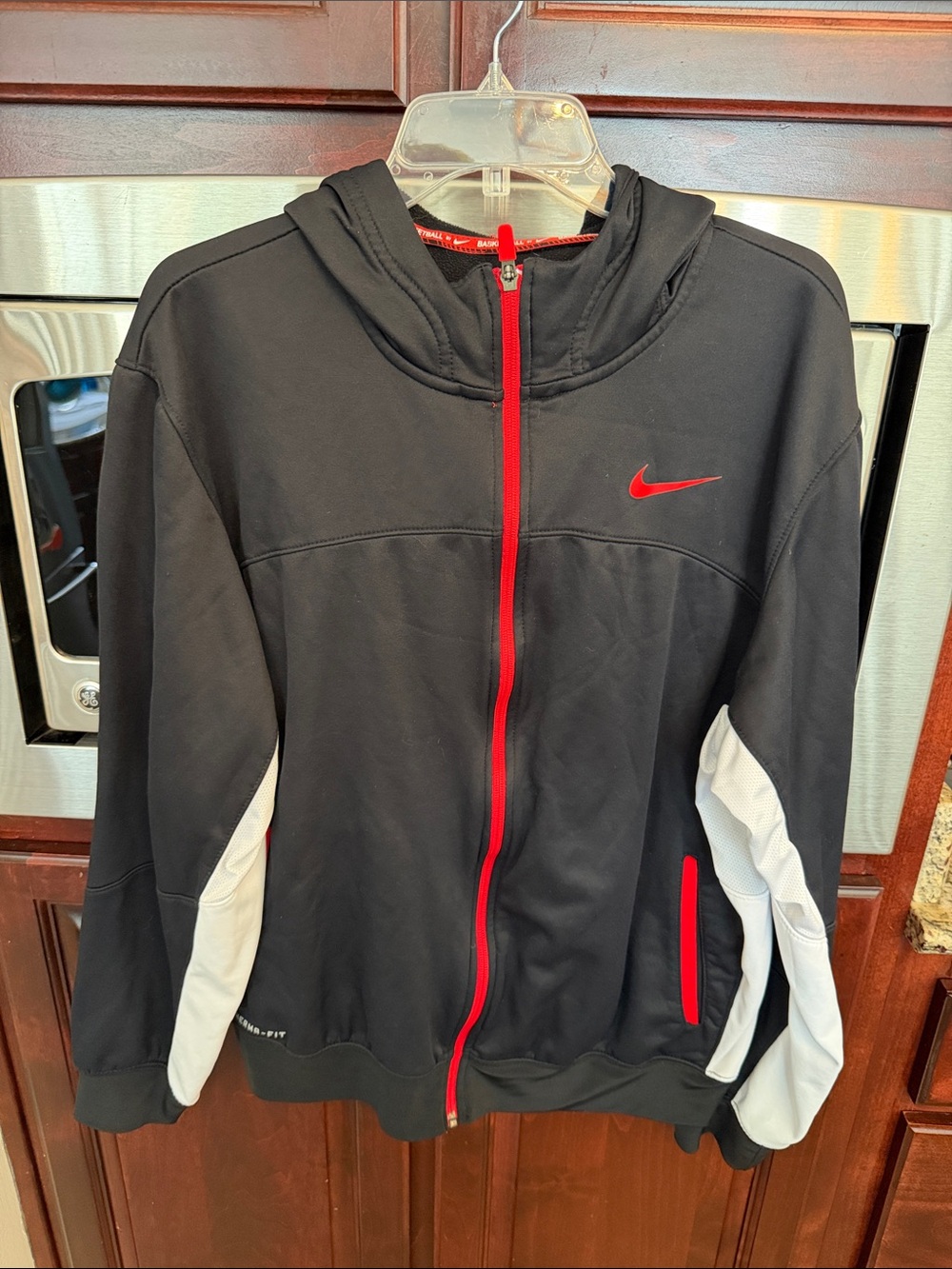 Nike Black Hooded Performance Jacket with Red Trim and White Panels